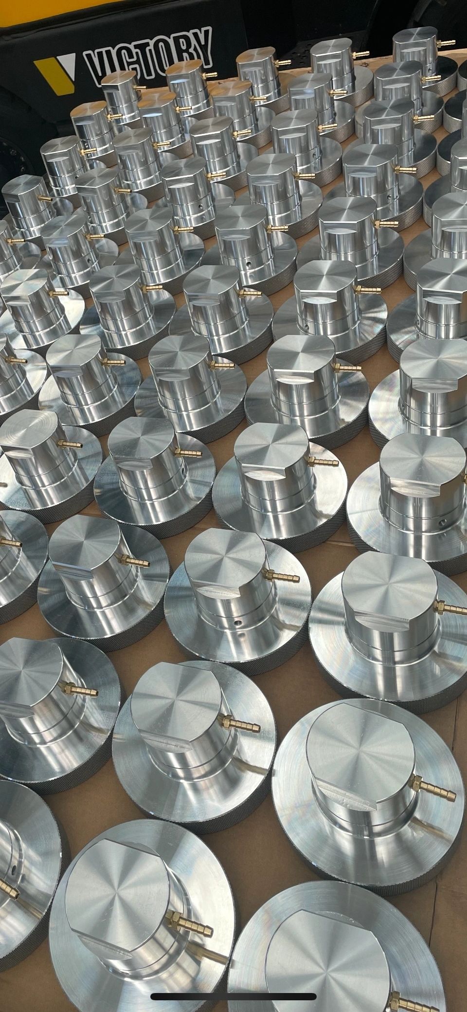 Large batch of precision machined aluminium caps with brass fittings, Padco Engineering