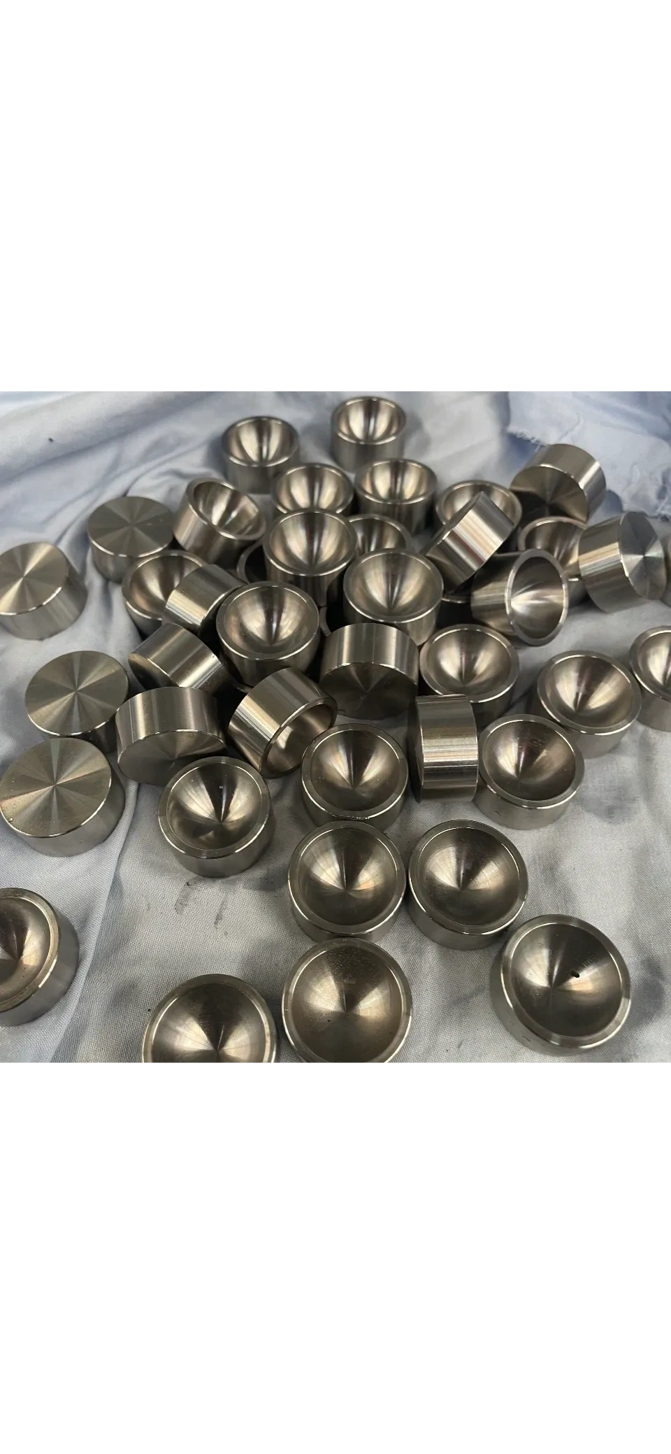Production batch of identical machined cup parts, Padco Engineering